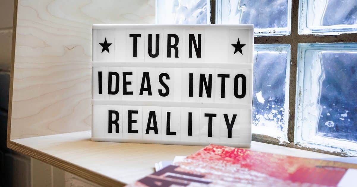 Sign with the sentence: Turn your ideas unto reality